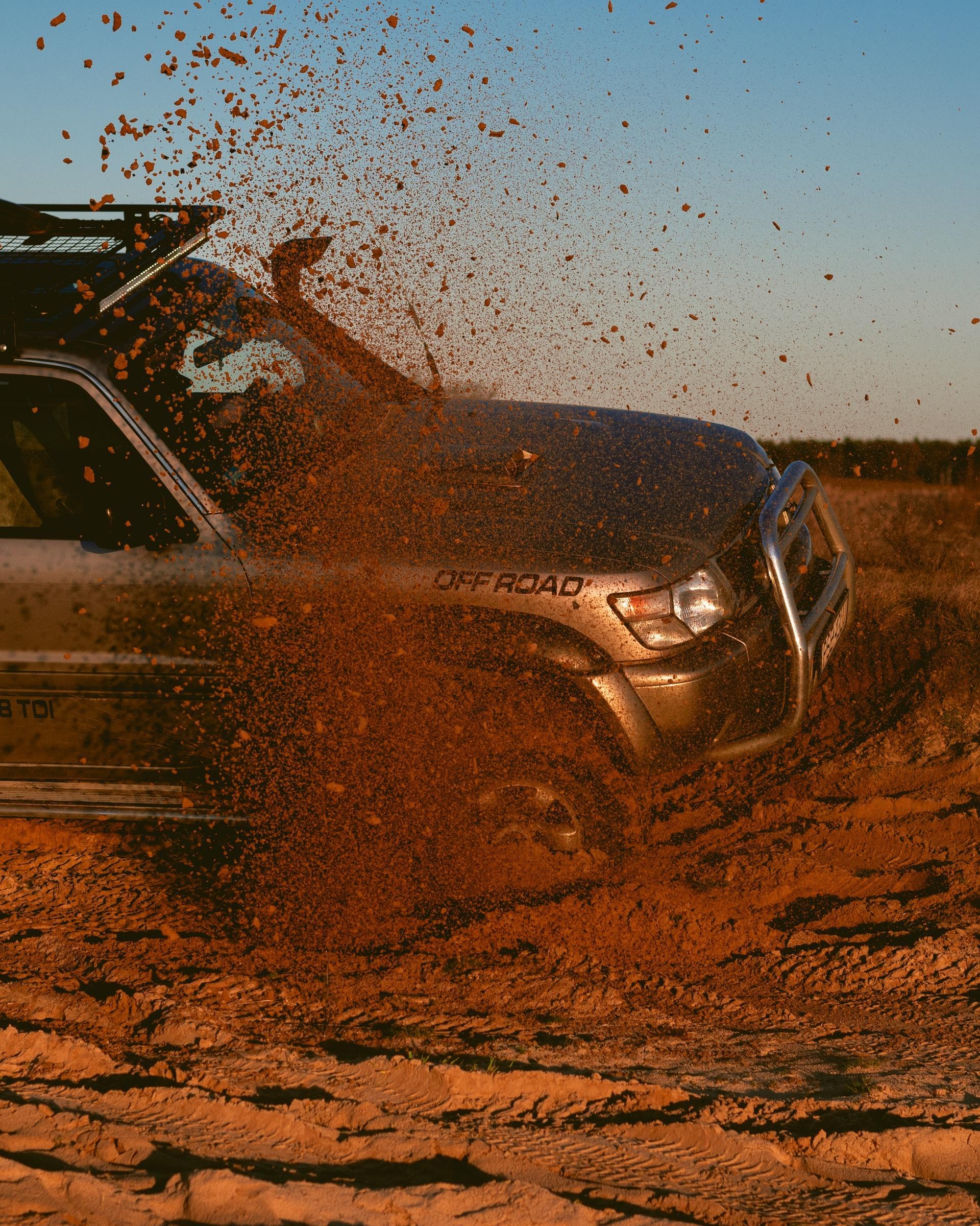 Off-road vehicle in dirt